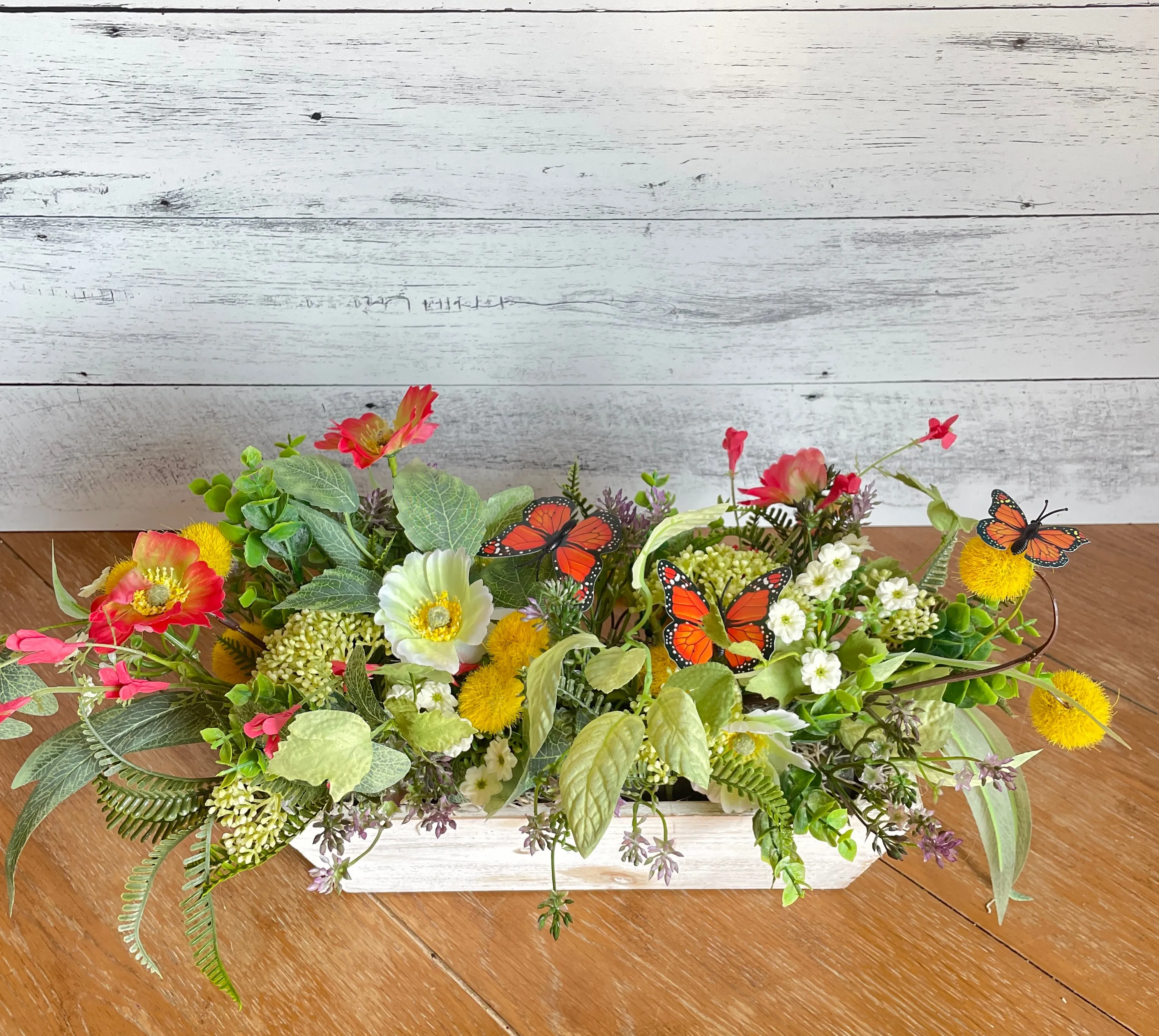 Butterfly and poppies centerpiece