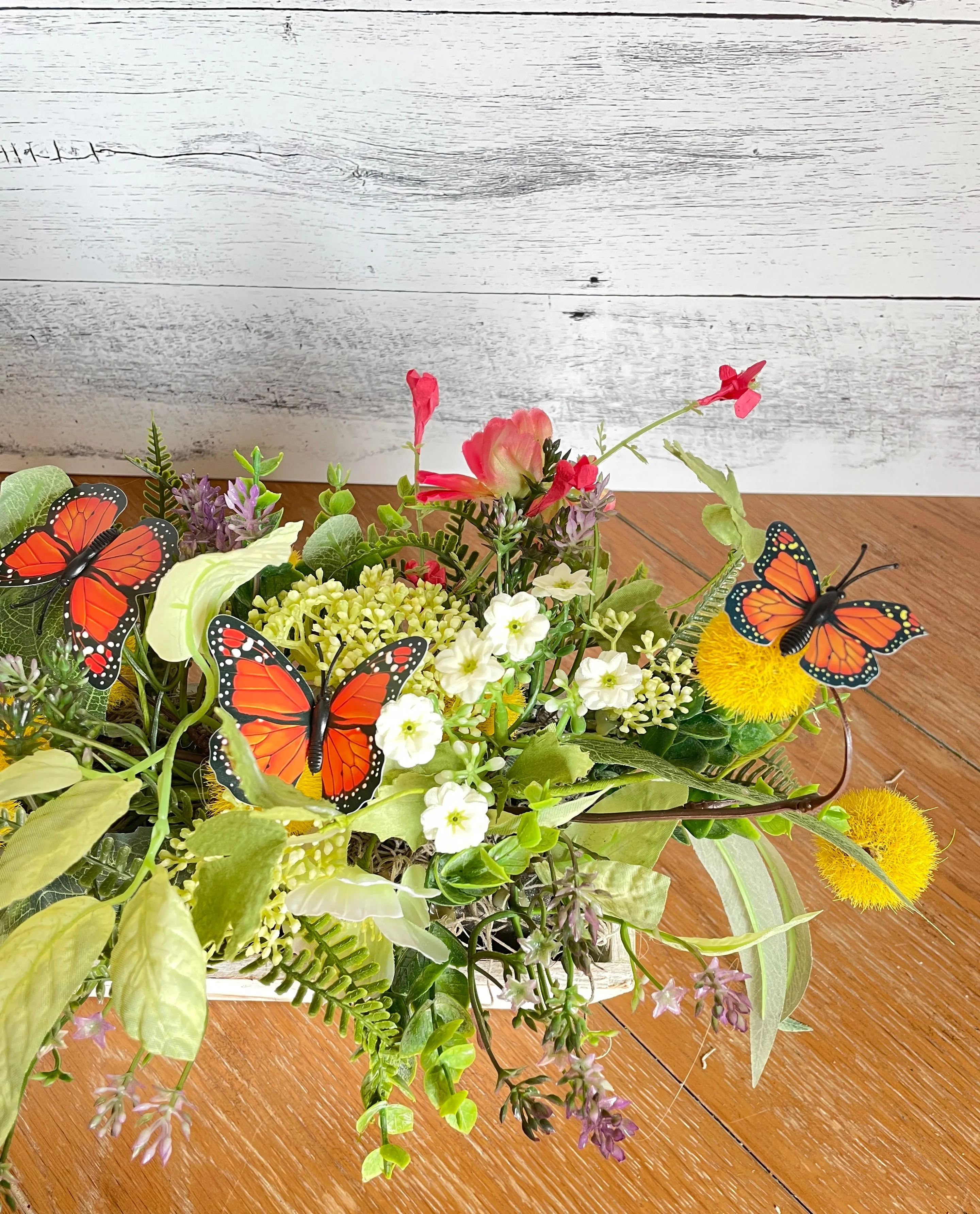 Butterfly and poppies centerpiece