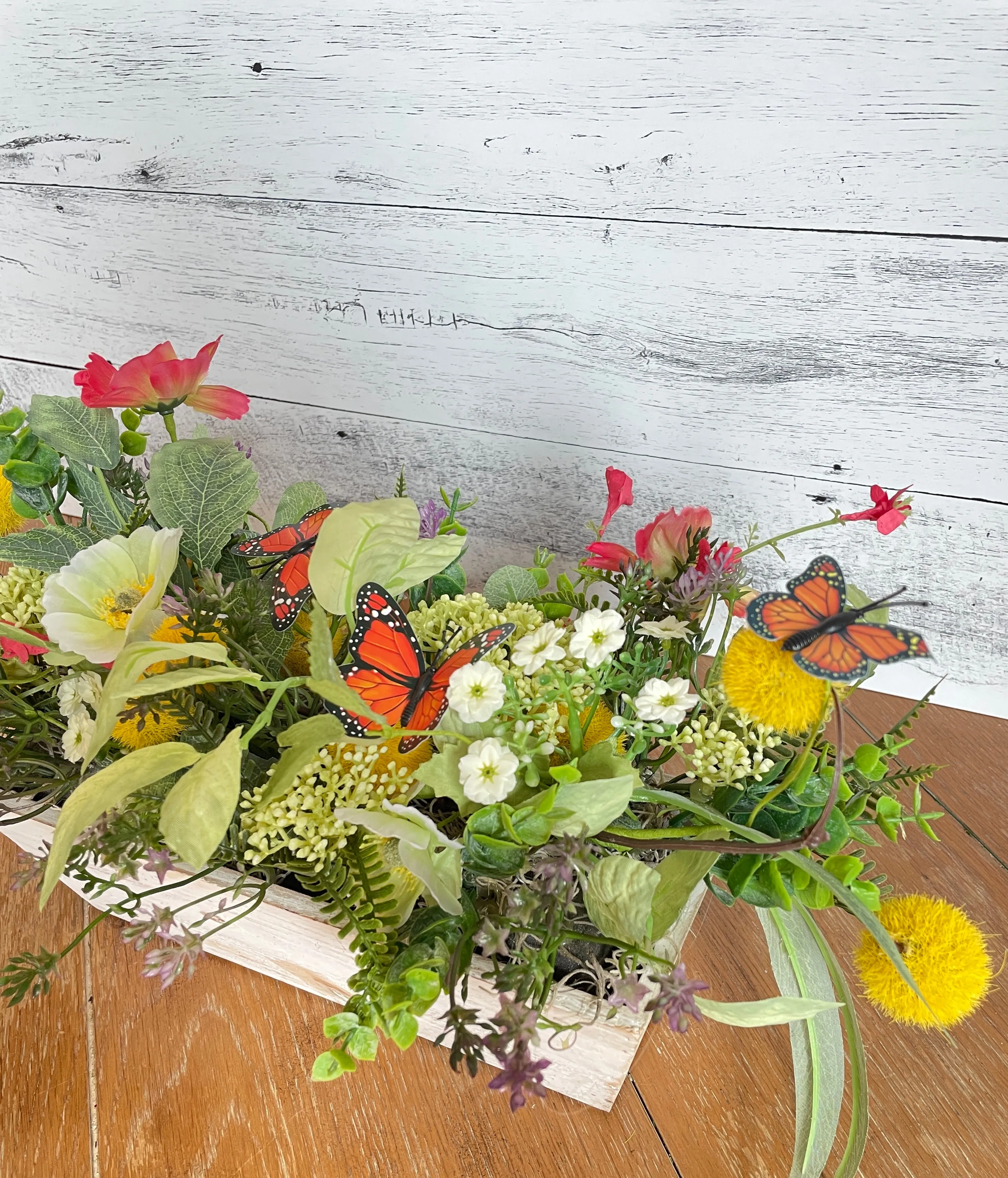 Butterfly and poppies centerpiece