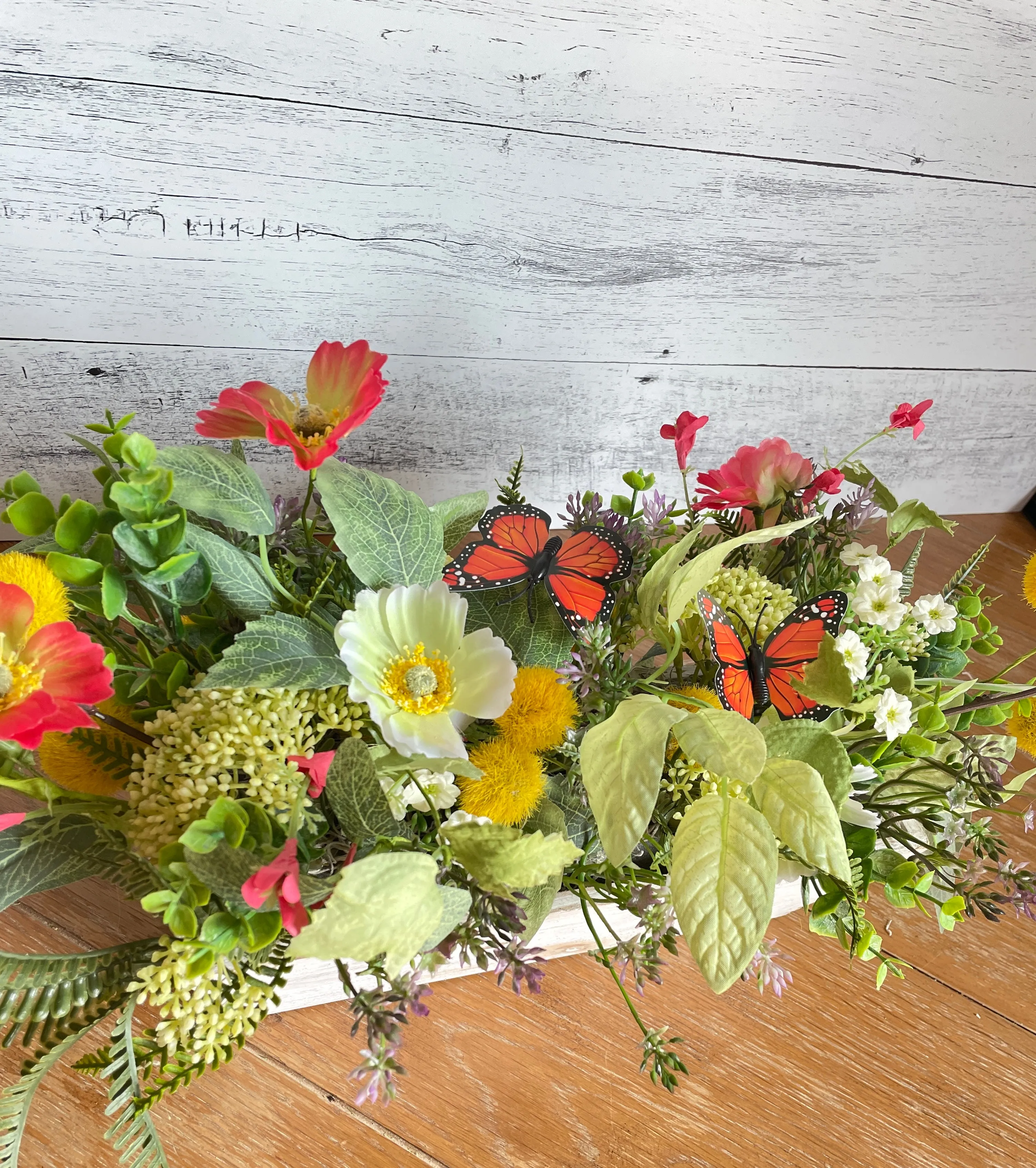 Butterfly and poppies centerpiece