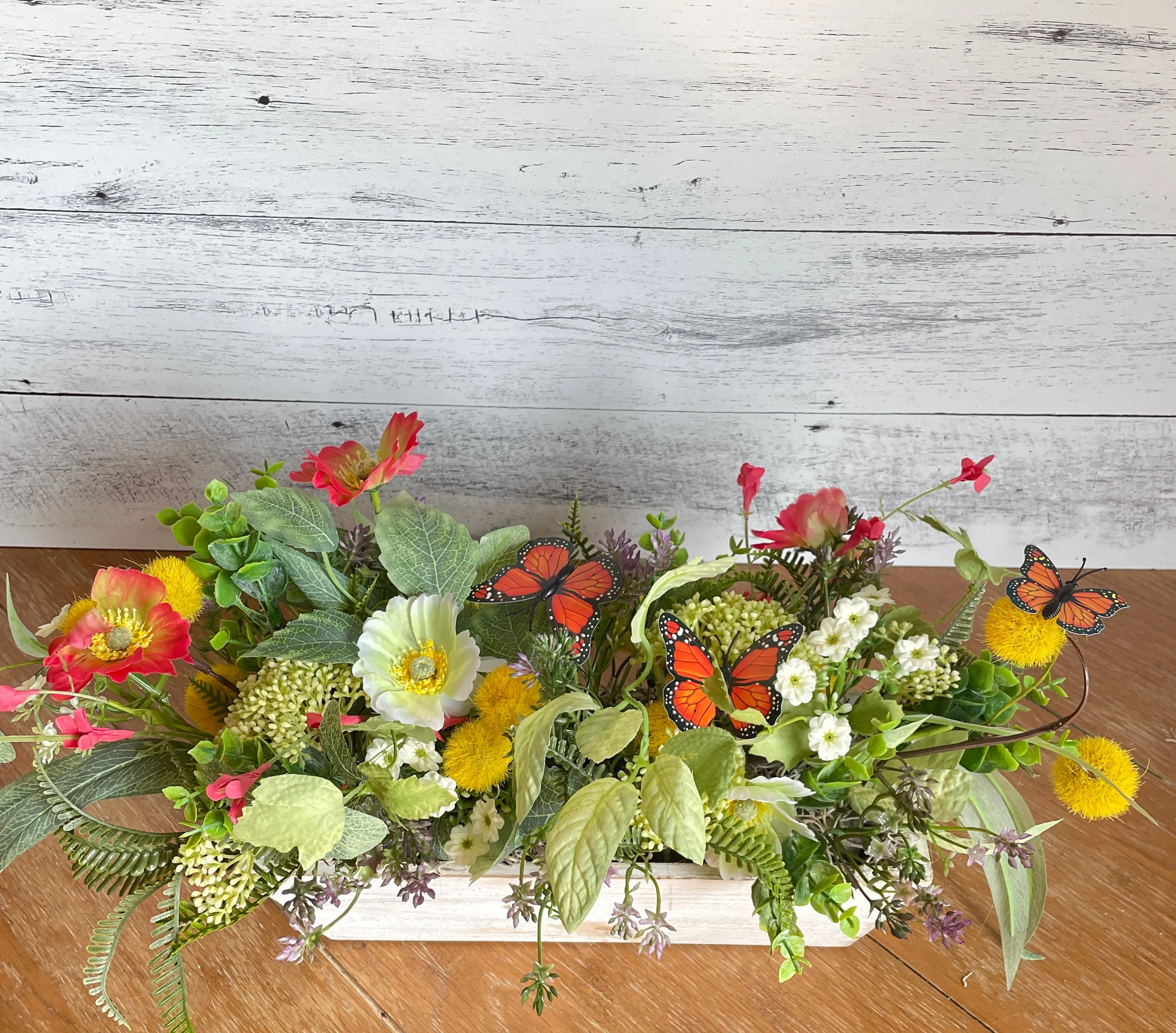 Butterfly and poppies centerpiece